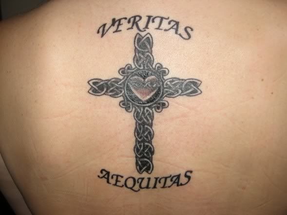irish cross tattoo. This is my first tattoo and it